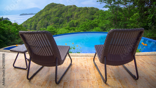 Resort Pool Chairs and Island View - Caramoan  Philippines