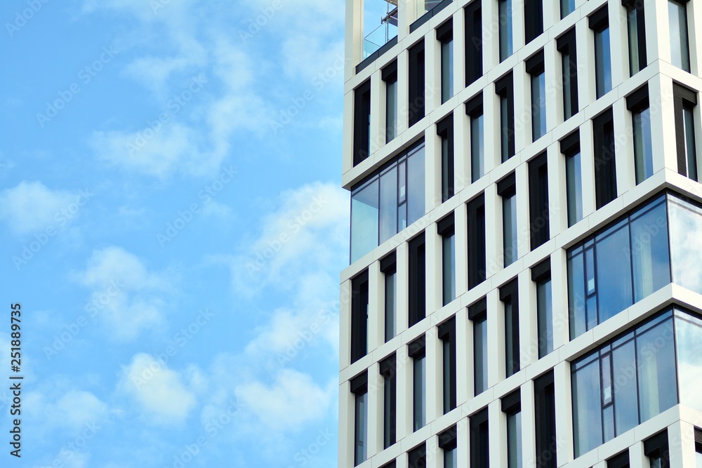 Tthe windows of a modern building for offices Tthe windows of a modern building for offices