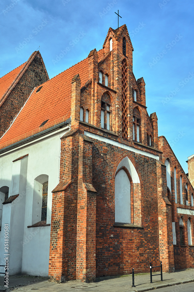 facade of gothic Catholic Church in Poznan.