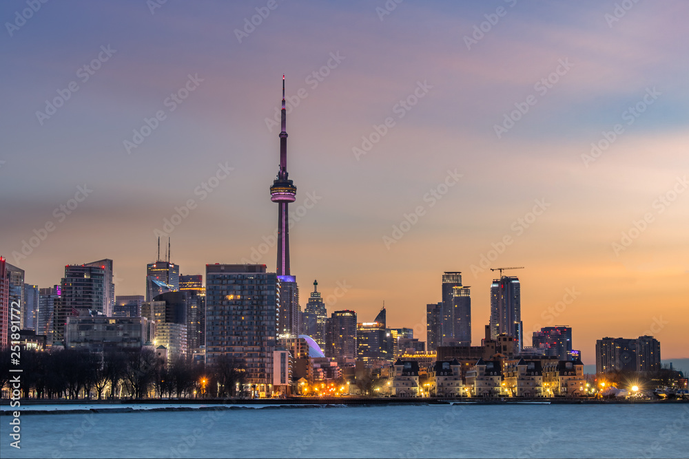 The Toronto skyline at sunrise, as seen from one of the cities newest parks, Trillium Park. The Toronto skyline at sunrise, as seen from one of the cities newest parks, Trillium Park.