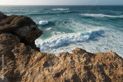 The power of ocean waves and portuguese rocky coast from Lagos, Algarve