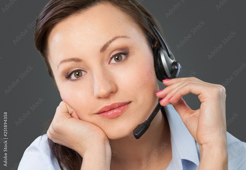 Woman Call Center operator on dark background Woman Call Center operator on dark background