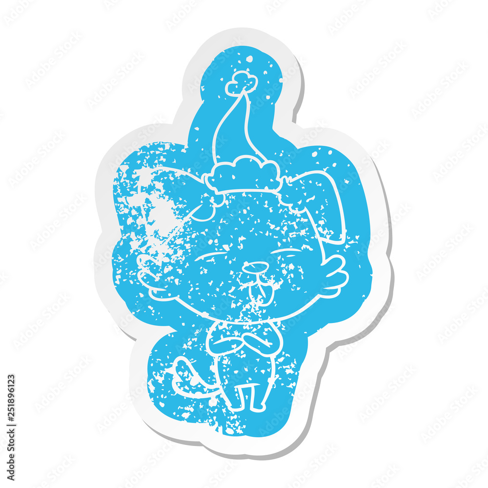 cartoon distressed sticker of a dog sticking out tongue wearing santa hat cartoon distressed sticker of a dog sticking out tongue wearing santa hat