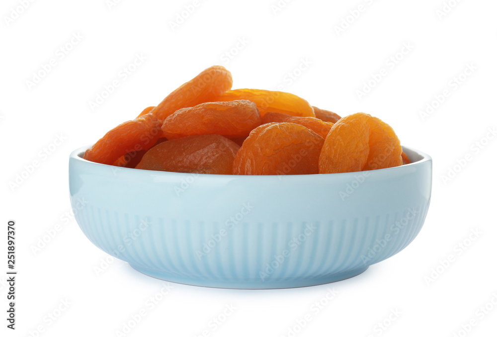 Bowl with apricots on white background. Dried fruit as healthy food Bowl with apricots on white background. Dried fruit as healthy food