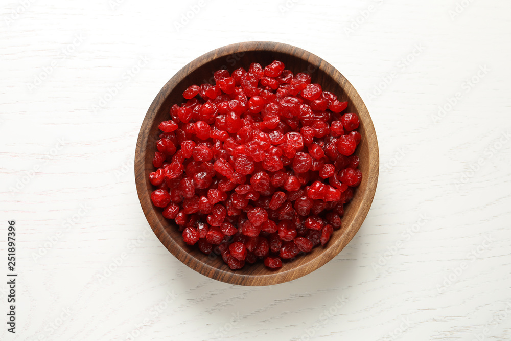 Bowl with tasty cherries on wooden background, top view. Dried fruits as healthy food Bowl with tasty cherries on wooden background, top view. Dried fruits as healthy food