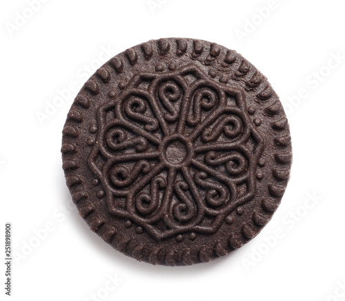 Tasty chocolate cookie with cream on white background, top view