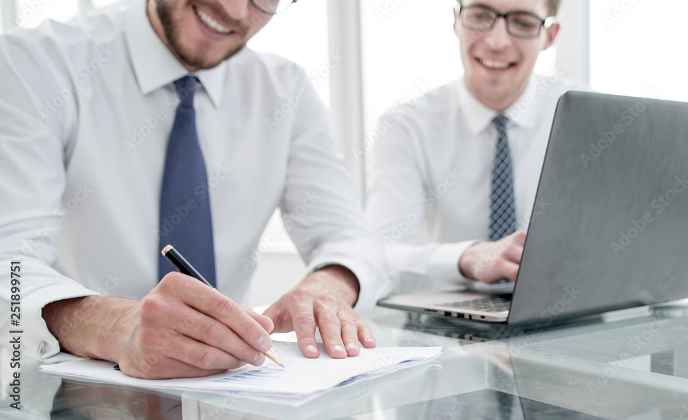 businessman makes notes for a new business project. businessman makes notes for a new business project.
