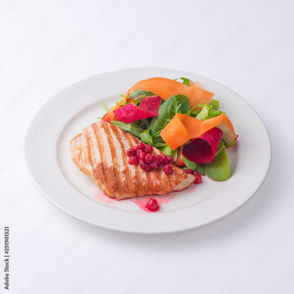 Chicken fillet steak with salad and white sauce. Chicken fillet steak with salad and white sauce.