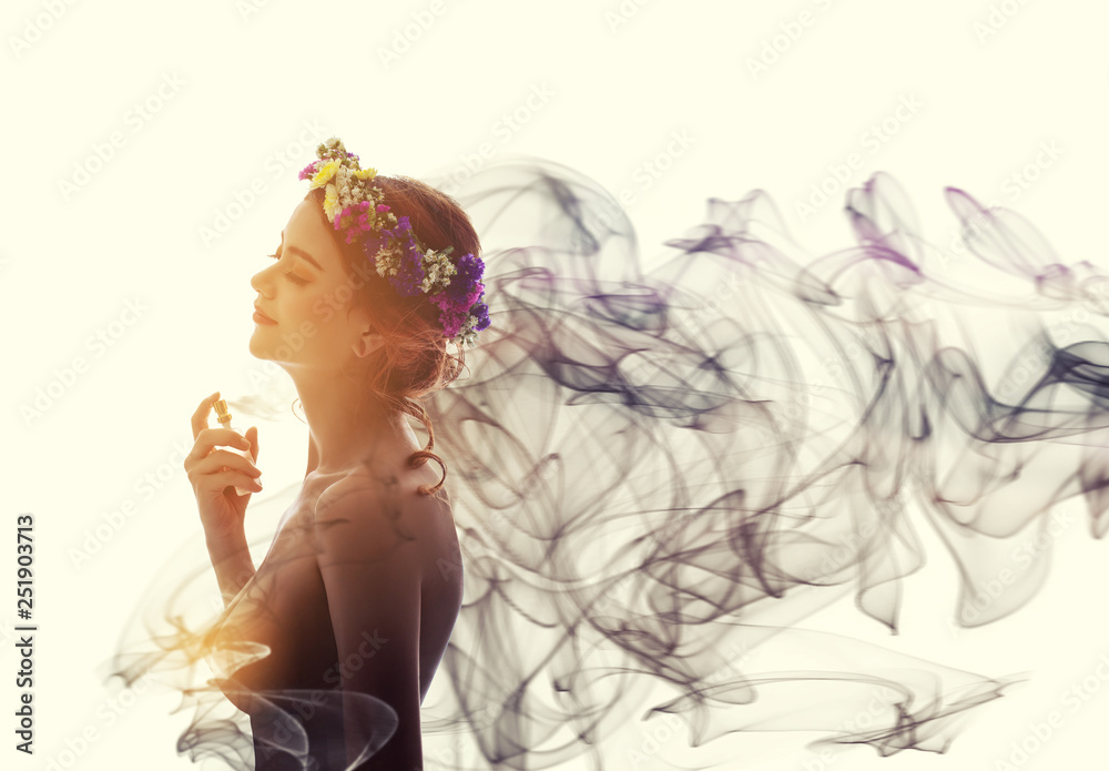 Fototapeta premium Charming woman spray perfume on her body. She has sexual attraction.
