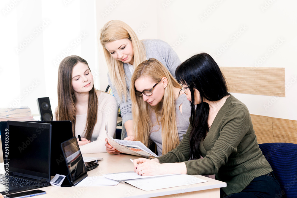 lesson teacher school table computer business team workspace class mate group woman man room lesson teacher school table computer business team workspace class mate group woman man room