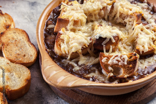 Delicious onion soup with croutons and cheese