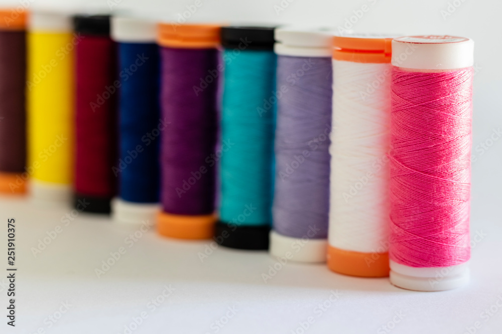 close-up on sewing thread spools close-up on sewing thread spools