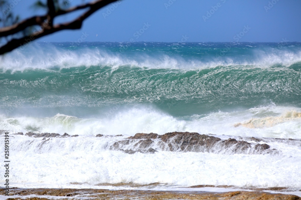 Perfect waves and surfing at Snapper Rocks during Cyclone Oma, Gold Coast., Queensland Australia