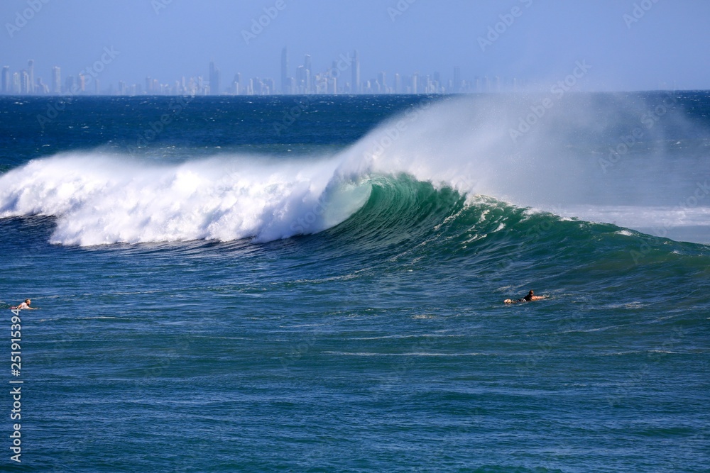 Perfect waves and surfing at Snapper Rocks during Cyclone Oma, Gold Coast., Queensland Australia Perfect waves and surfing at Snapper Rocks during Cyclone Oma, Gold Coast., Queensland Australia