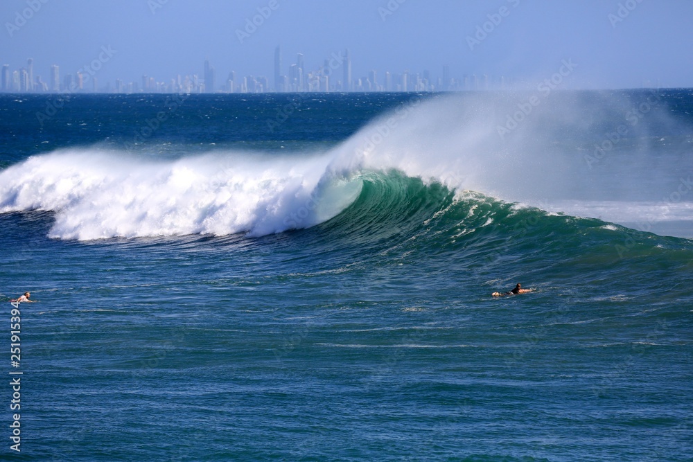 Perfect waves and surfing at Snapper Rocks during Cyclone Oma, Gold Coast., Queensland Australia