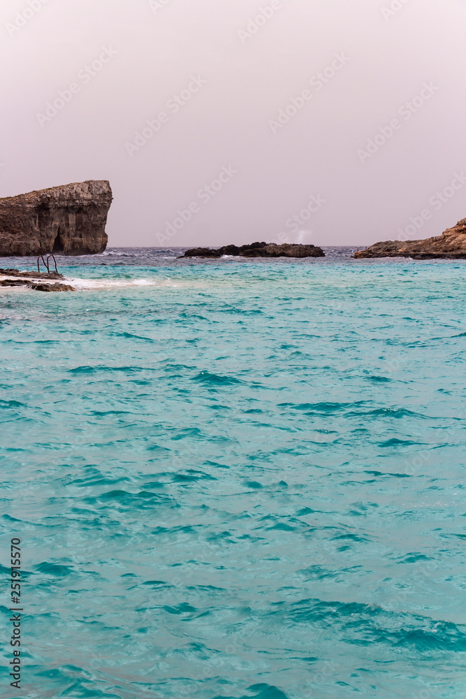 Crystal Blue Lagoon water spring view from the island of Comino, Malta