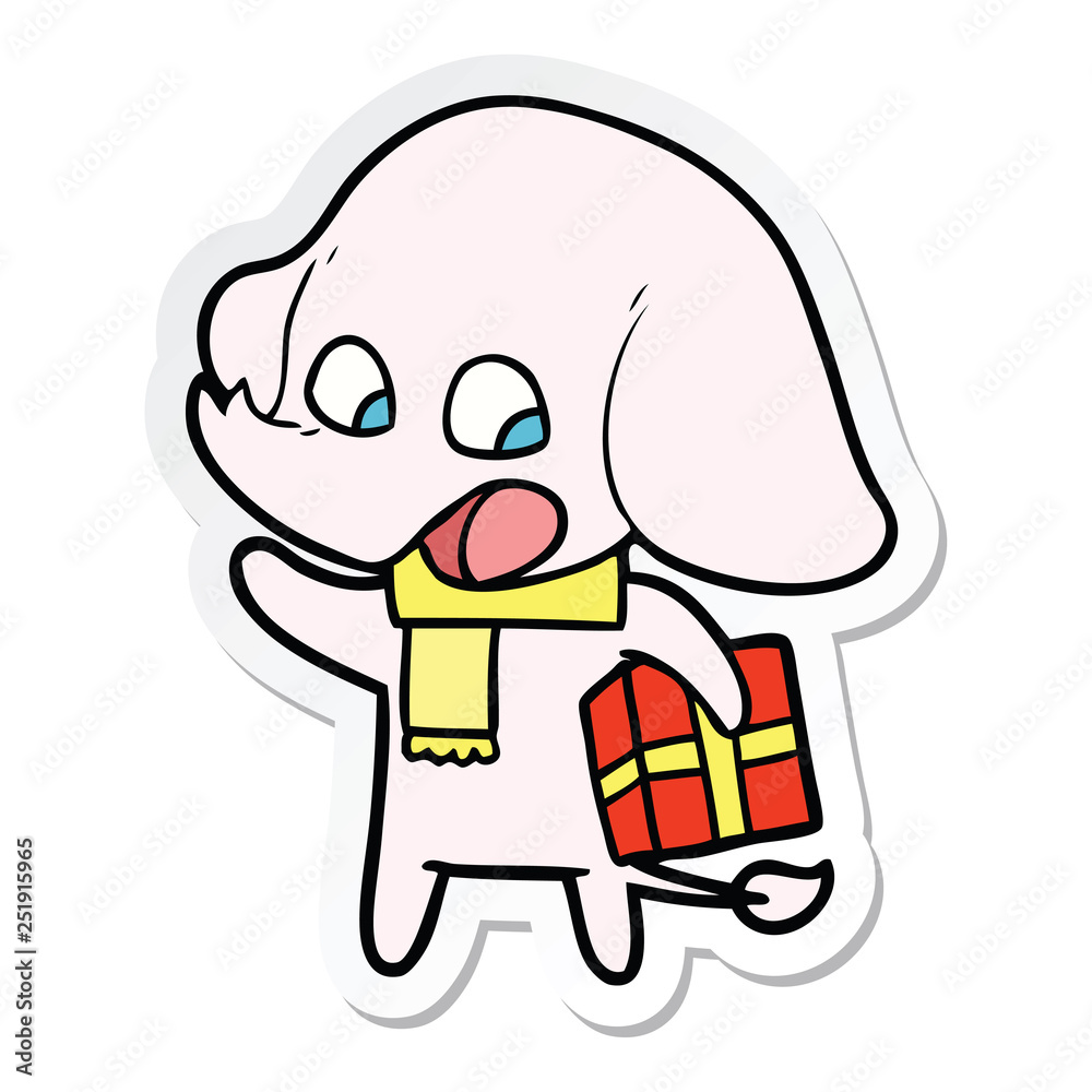 sticker of a cute cartoon elephant with christmas present sticker of a cute cartoon elephant with christmas present