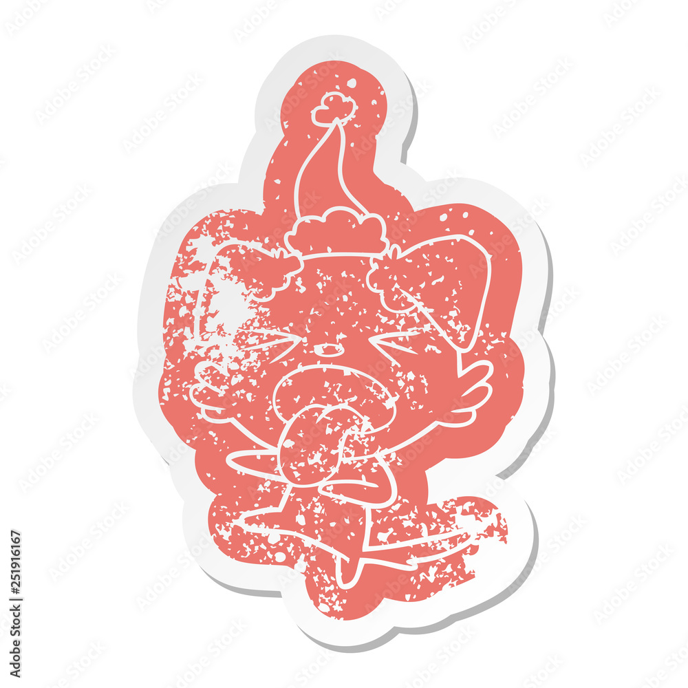 cartoon distressed sticker of a disgusted dog wearing santa hat cartoon distressed sticker of a disgusted dog wearing santa hat