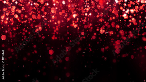 Holiday abstract red background with falling glitter particles. Beautiful festive sparkling luxury background. Shiny particle bokeh with magic light. Valentines day