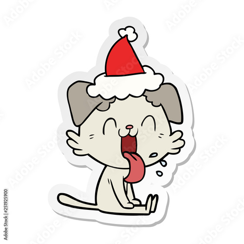 sticker cartoon of a panting dog wearing santa hat
