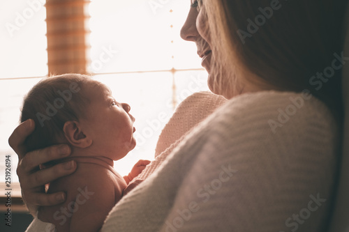 Photography Woman and baby looking at each other