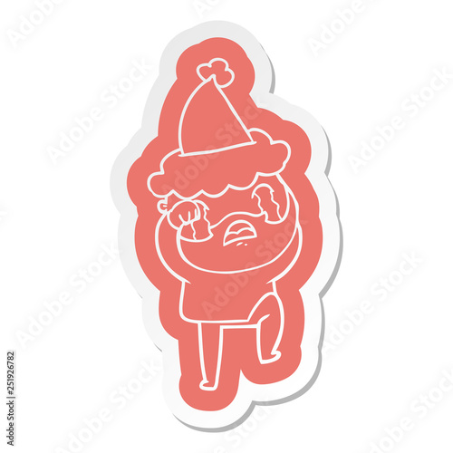 cartoon sticker of a bearded man crying and stamping foot wearing santa hat