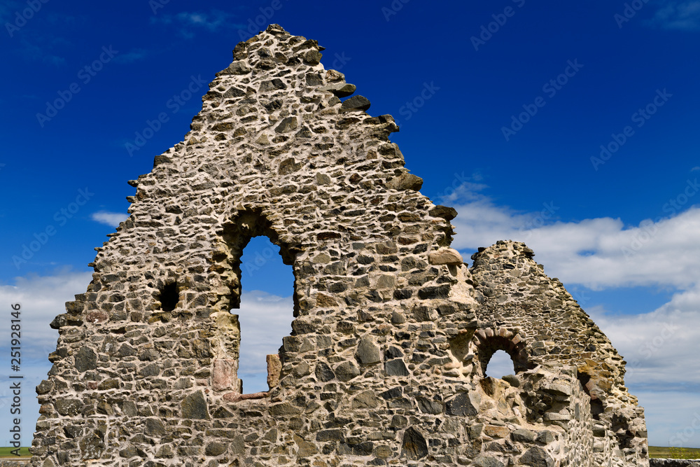 13th Century St Mary Chapel ruins of fieldstone at Old Rattray Aberdeenshire Scotland UK with blue sky