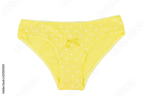 Yellow cotton women's briefs isolated on white background.