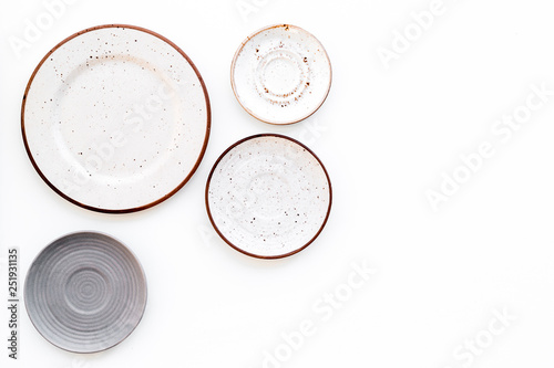 Mockup with plates. Empty ceramic plates on white background top view space for text