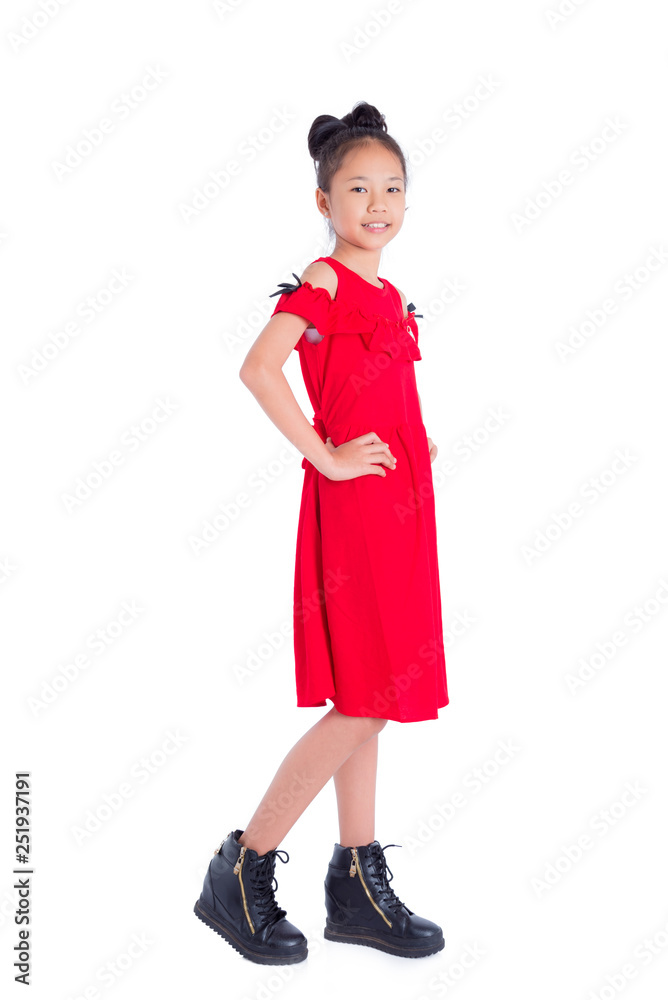 Full length of teenager asian girl smiling over white background Full length of teenager asian girl smiling over white background