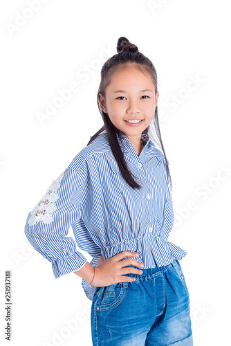 Cute teenager asian girl smiling over white background