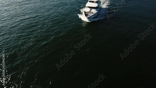 yacht in the ocean, aerial shot in malibu, california 