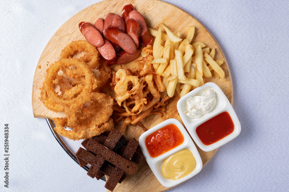 fried chicken, bread, sausages and sauce for lunch,garlic butter fried toast fried chicken, bread, sausages and sauce for lunch,garlic butter fried toast