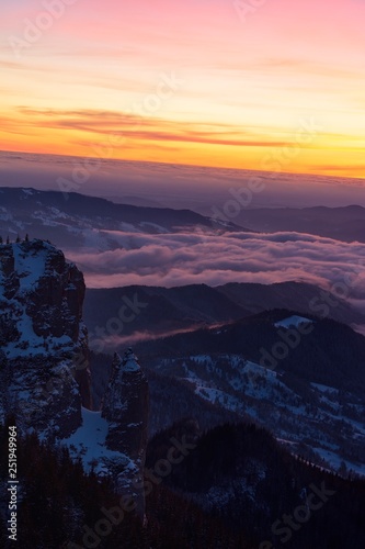 Amazing sunrise in Ceahlau mountains, winter landscape.
