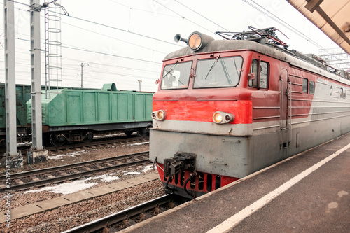Train at the station in winter, close-up