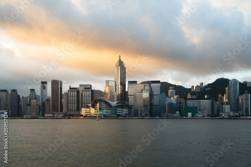 Hong Kong skyline with sunlight in the morning over Victoria Harbour in Hong Kong. © ake1150