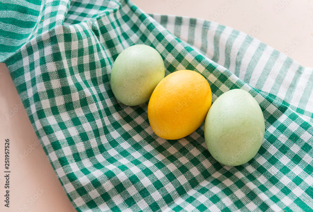3 Easter eggs, yellow and green boiled eggs 3 Easter eggs, yellow and green boiled eggs