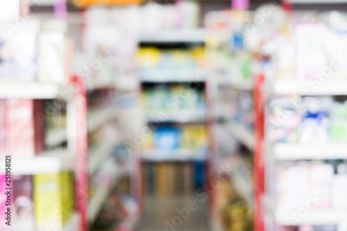 Blurred scene of aisle shelf colorful grocery supermarket