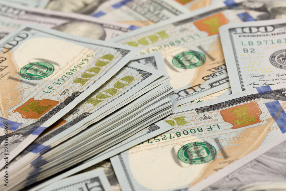 Stack of one hundred dollar bills close-up. - Image. Stack of one hundred dollar bills close-up. - Image.