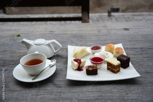 Картината върху платно Traditional afternoon tea set on wooden table