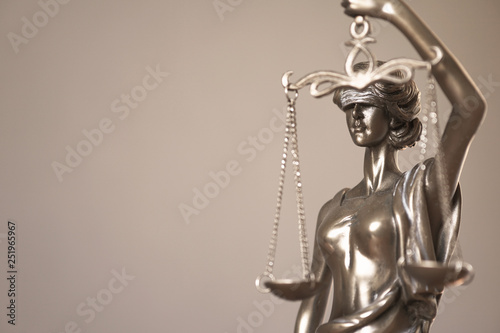 Carta da parati lady justice or justitia - detail of blind or blindfolded bronze statue holding