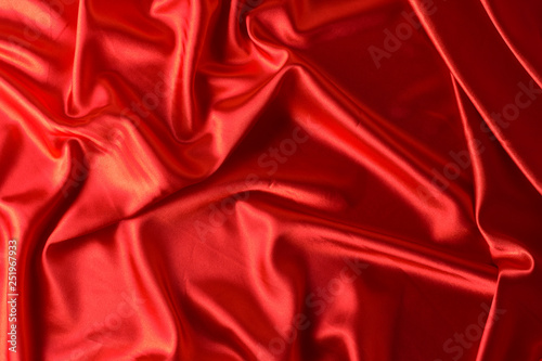 texture, red silk fabric panoramic photo. Silk Duke mood satin - beautiful and regal. photo