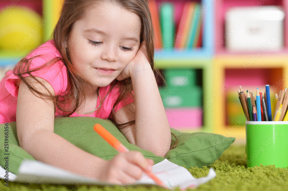 Portrait of cute little girl in pink shirt drawing Portrait of cute little girl in pink shirt drawing