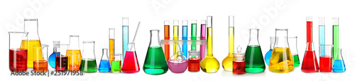 Laboratory glassware with color samples on white background