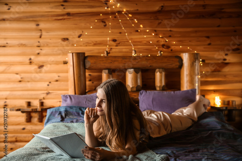 Beautiful woman reading boo...