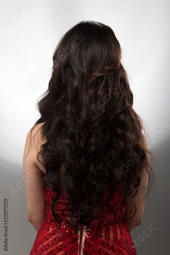 Asian Woman after applying make up hair style. no retouch, fresh face with acne, eyes, cheek, nice smooth skin. Studio lighting white background, for Miss Beauty Contest Pageant, rear back side view