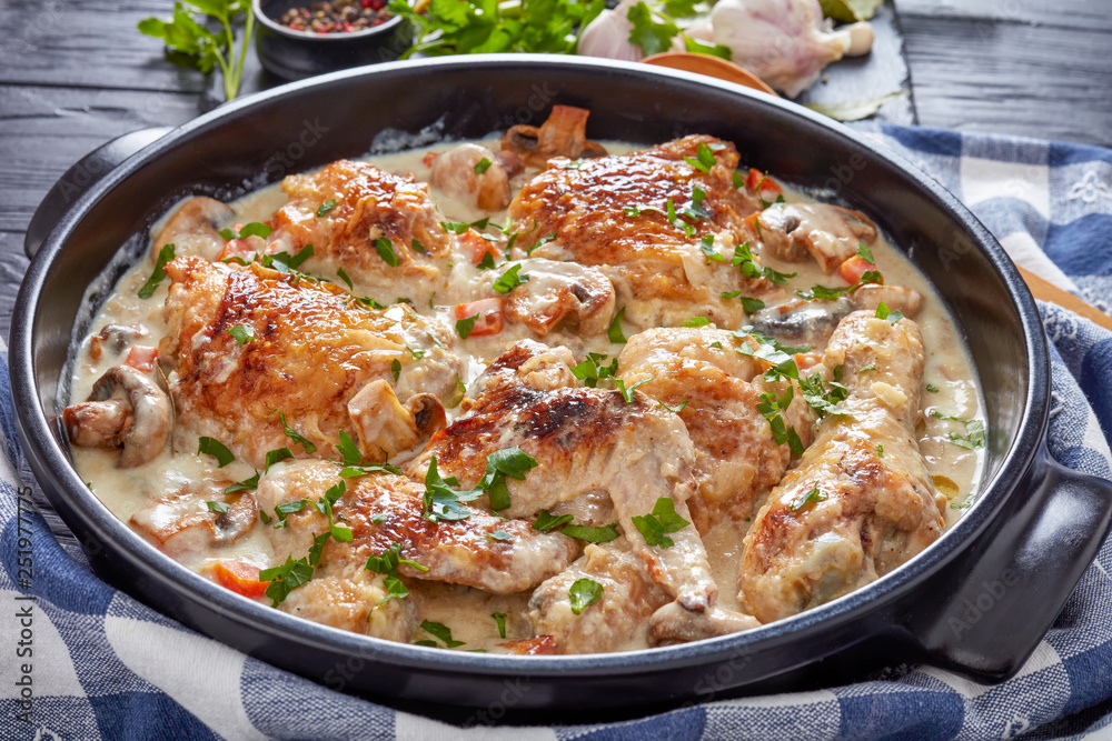 hot chicken fricassee in a black dutch oven hot chicken fricassee in a black dutch oven