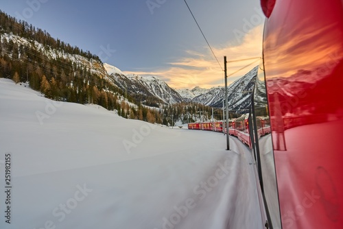The Bernina Express Red Train through the Alps photo