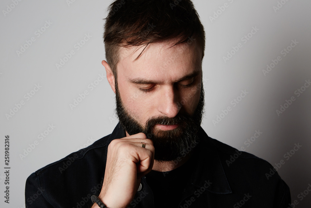 Handsome bearded man on empty background Handsome bearded man on empty background