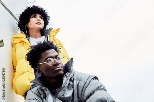 Thoughtful couple outdoors